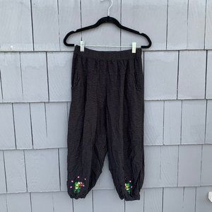 New black floral embroidered cropped jogger pants